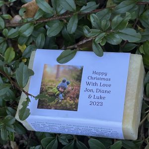 Picture of a bar of shampoo soap on the lable is a small boy and the words Merry Christmas With Love Jon, Dianne and Luke 2023
